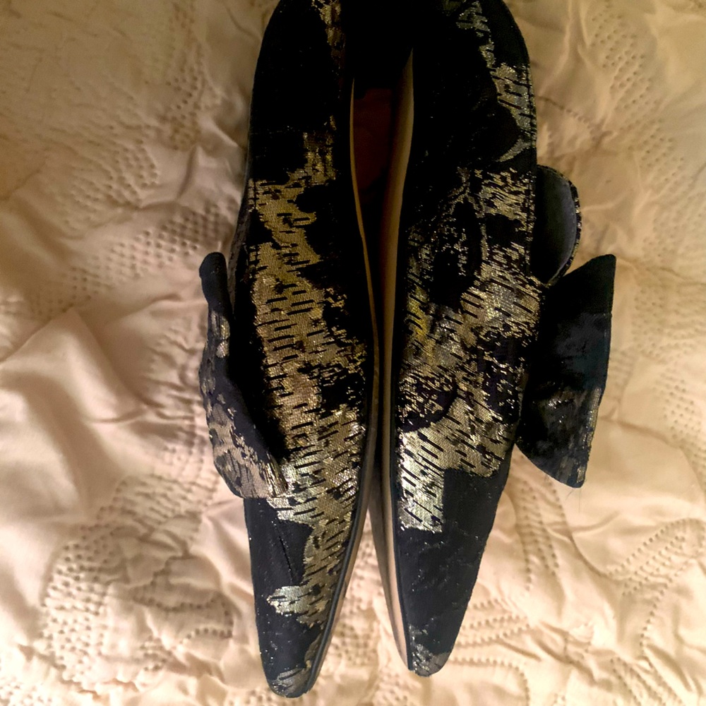 Dressy flat mules. Black and gold. Will add style to any outfit.  Like new.